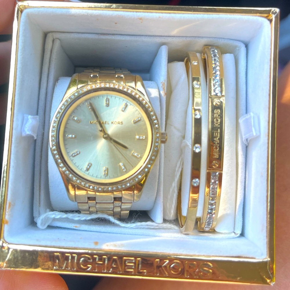 Michael Kors lady’s watch and bracelets